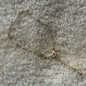 Elegant Gold and Pearl Bracelet